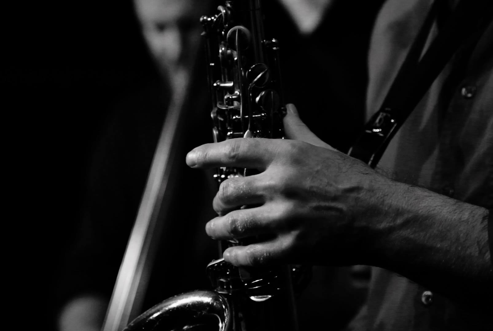 Close-up (black & white) of Montral improvising saxophonist Yves Charuests fingers. Image  Tatiana Kalantzis.